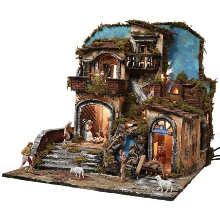 Illuminated nativity scene with functioning waterfall and fire effect