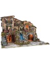 Illuminated nativity scene with waterfall, fountain, and