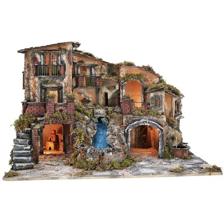 Illuminated nativity scene with waterfall, working fountain, and oven cm