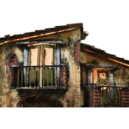 Belén iluminado completo con estatuas, cascada, fuente y