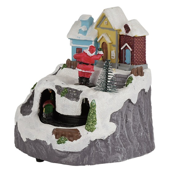 Village with Santa Claus and train complete with lights and