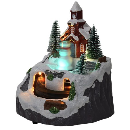 Pueblo con muñeco de nieve y tren completo con luces y sonidos.