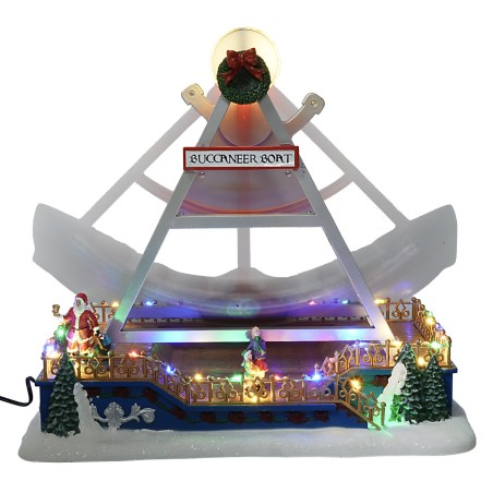 Carrusel navideño con barco oscilante completo de luces y música.