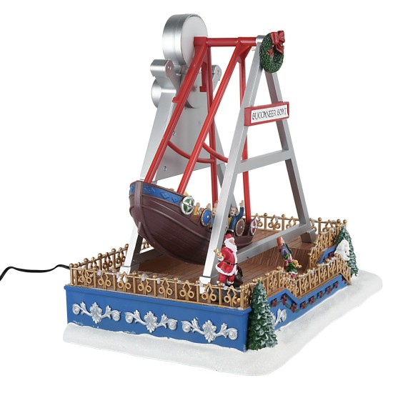 Christmas carousel with rocking ship complete with lights and