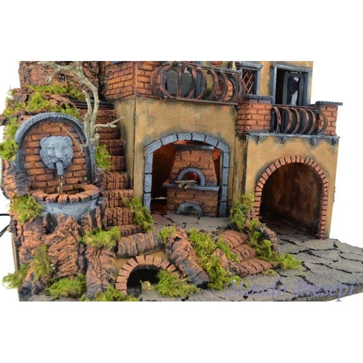 Nativity scene with illuminated village with fountain and oven 50x40