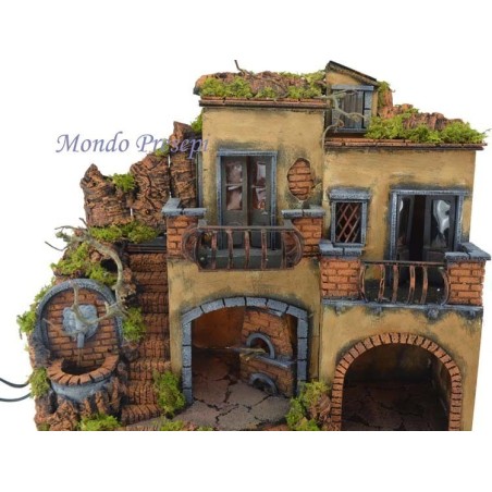 Presepe con borgo illuminato con fontana e forno 50x40 Mondo