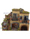 Nativity scene with illuminated village with fountain and oven 50x40