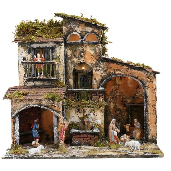 Illuminated nativity scene with working fountain and oven, dimensions 46x32x45 cm.