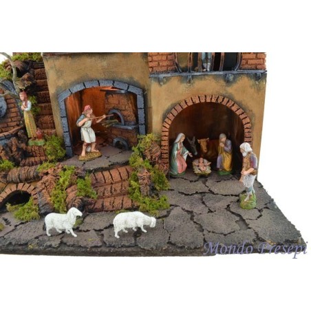 Pesebre completo con figuras Landi iluminado con fuente y horno