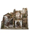 Presepe con statue illuminato con mulino completo di pompa a