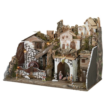 Presepe con statue illuminato con mulino completo di pompa a