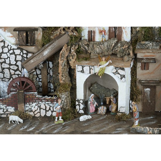 Nativity scene with illuminated statues with mill complete with pump