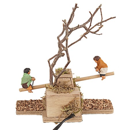 Bimbi sul dondolo in movimento 12 cm per presepe Mondo Presepi