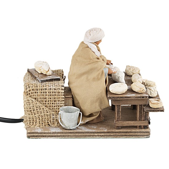 Donna che impasta serie 10 cm in movimento per presepe Mondo