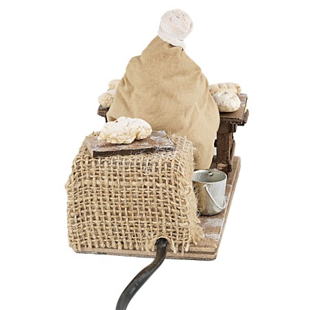 Donna che impasta serie 10 cm in movimento per presepe Mondo