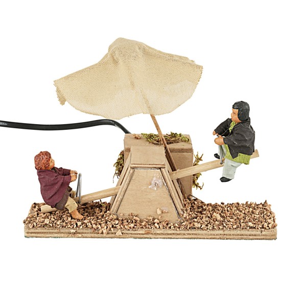 Bimbi sul dondolino in movimento 12 cm