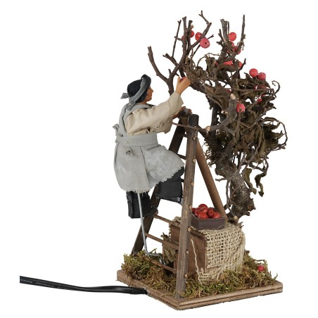 Uomo su scala con albero in movimento 12 cm per presepe Mondo