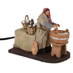 Donna che lava bimbo 12 cm in movimento per presepe Mondo 2