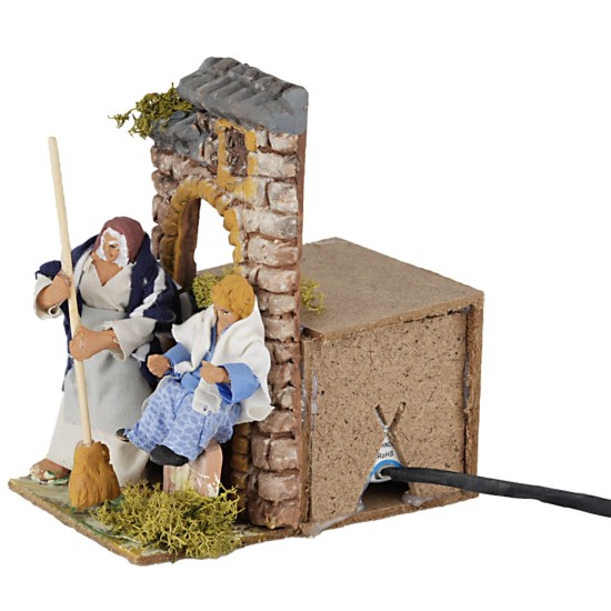 Donna che spazza 10 cm in movimento per presepe Mondo Presepi