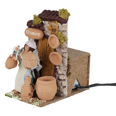 Donna che vende terracotta 10 cm in movimento per presepe Mondo