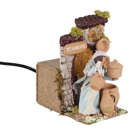 Donna che vende terracotta 10 cm in movimento per presepe Mondo