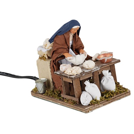 Donna che impasta 12 cm in movimento per presepe Mondo Presepi