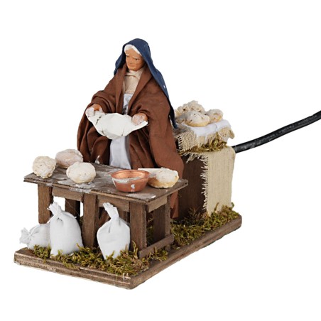 Donna che impasta 12 cm in movimento per presepe Mondo Presepi