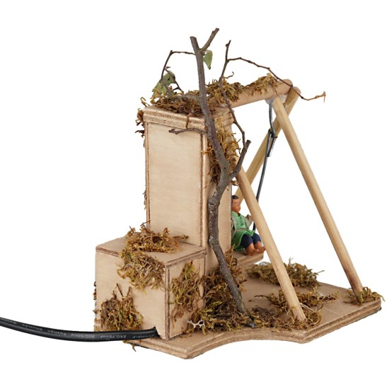 Bambino su altalena 10 cm in movimento per presepe Mondo Presepi