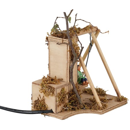 Bambino su altalena 10 cm in movimento per presepe Mondo Presepi
