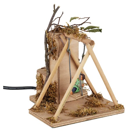 Bambino su altalena 10 cm in movimento