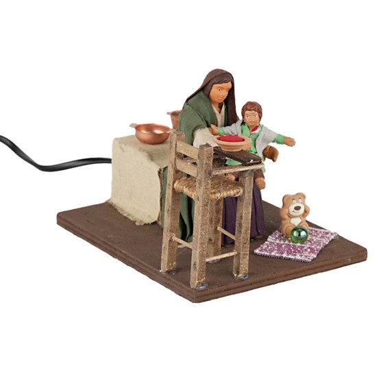 Mamma con bambino 10 cm in movimento per presepe Mondo Presepi