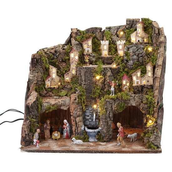 Complete nativity scene with statues, lights, and functional fountain