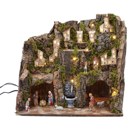 Complete nativity scene with statues, lights, and functional fountain