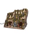 Pesebre completo con estatuas, luces y fuente en funcionamiento completo