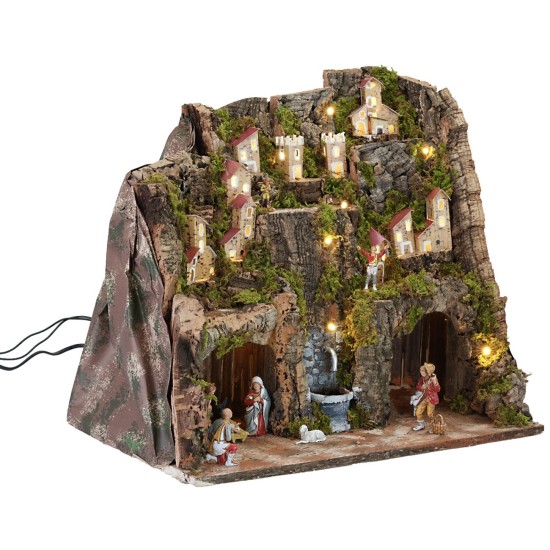 Complete nativity scene with statues, lights, and functional fountain