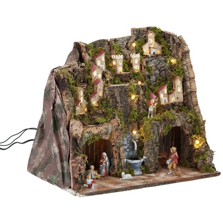 Pesebre completo con estatuas, luces y fuente en funcionamiento completo