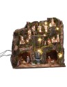 Pesebre completo con estatuas, luces y fuente en funcionamiento completo