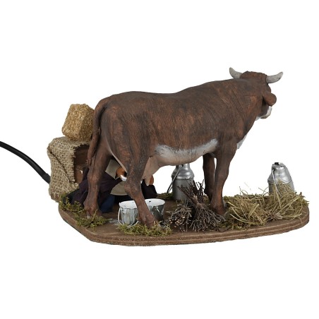Uomo che munge 12 cm in movimento per presepe Mondo Presepi