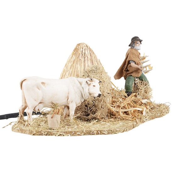 Pastore con bue 10 cm con doppio movimento per presepe Mondo