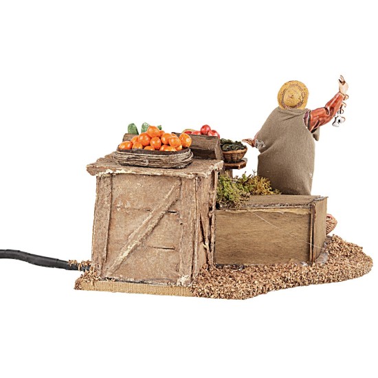 Fruttivendolo 10 cm in movimento per presepe Mondo Presepi