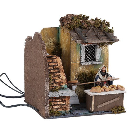 Fornaio 10 cm in movimento con fuoco e luce per presepe Mondo