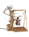 Bambina sull'altalena serie 24 cm in movimento