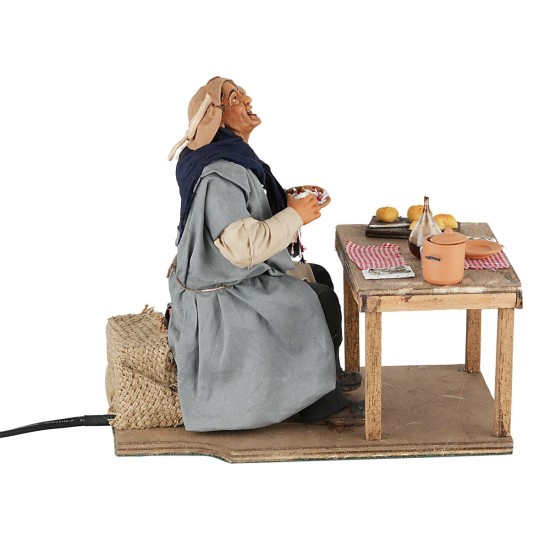 Uomo che mangia serie 30 cm in movimento per presepe Mondo