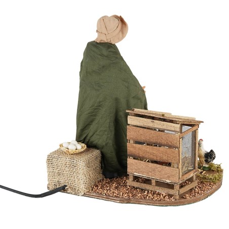 Woman feeding chickens in motion 30 cm