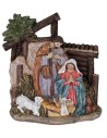 Natividad en resina con San José, María arrodillada, el Niño Jesús en la cuna y una ovejita.