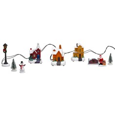 Working battery-operated houses and lamppost with pine figurines