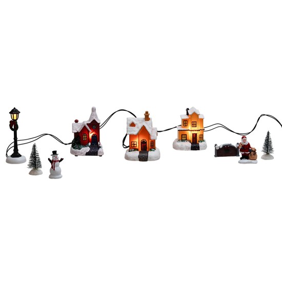 Working battery-operated houses and lamppost with pine figurines