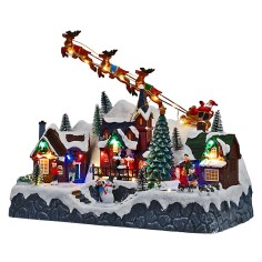 Escenario navideño con Papá Noel en trineo tirado por renos 2