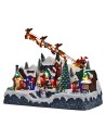 Christmas scene with Santa Claus on a sleigh pulled by reindeer