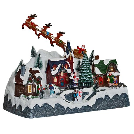 Christmas scene with Santa Claus on a sleigh pulled by reindeer